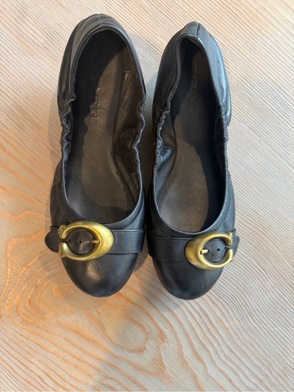 Coach Women's Black Leather Ballet Flats with Gold ‘C’ Buckle